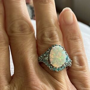 Elegant Opal and Blue Gemstone Ring